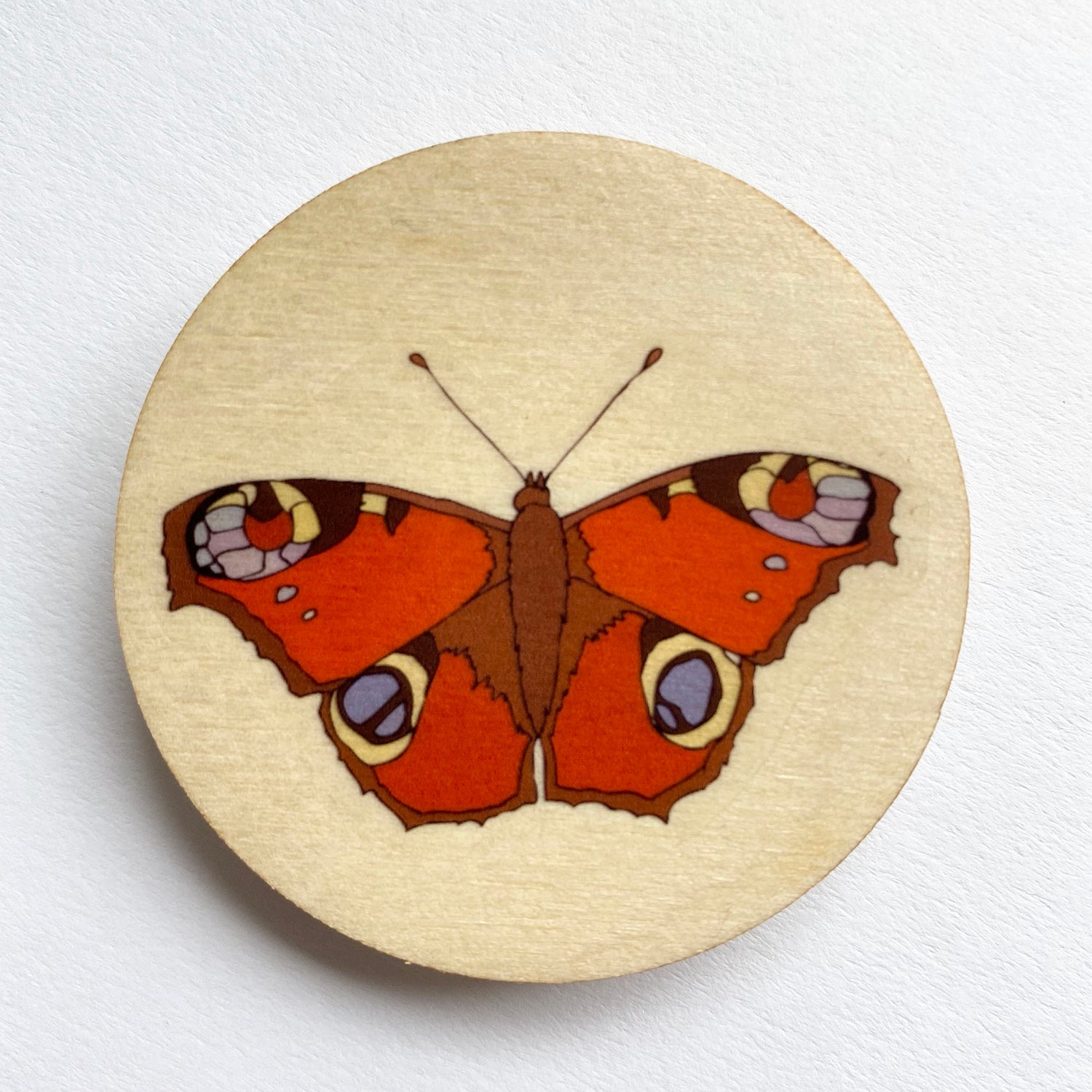 WOODEN BROOCHES