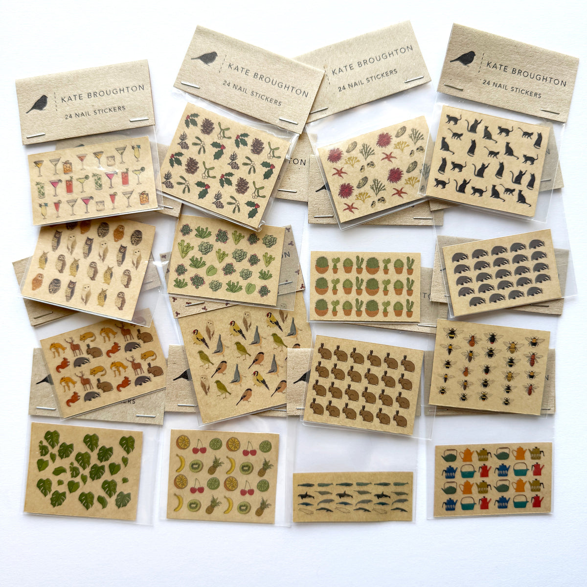 collection of nail art stickers of different designs - christmas, animals, plants, cats, birds, bees