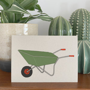 card with green wheelbarrow illustration