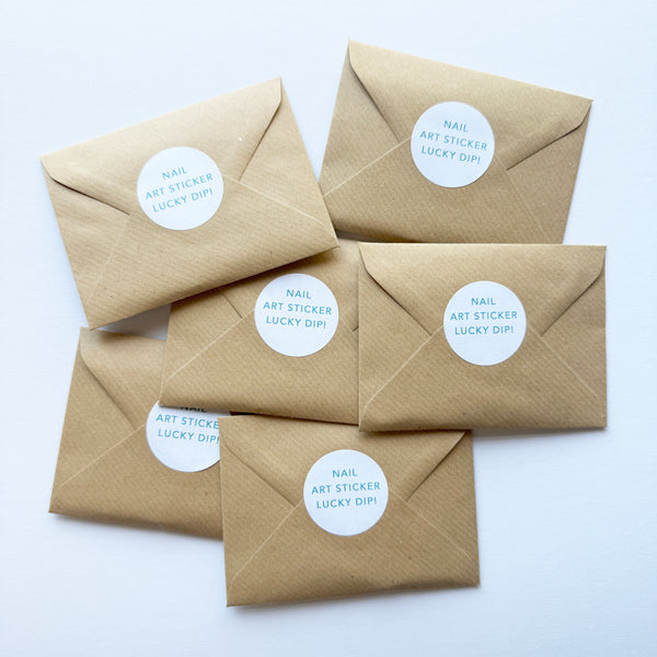Five brown envelopes with white labels on a white background